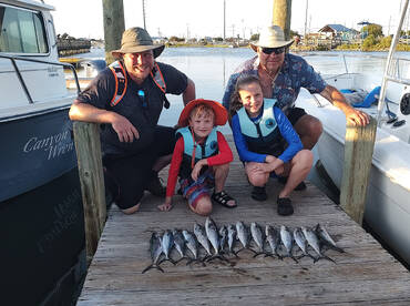 Happy fisherfolk at the end of the trip