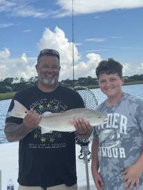 27” Redfish and 10 Flounder