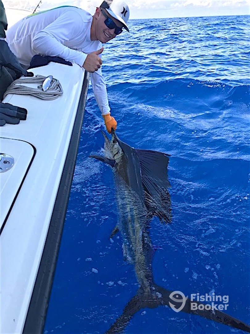 Steven with his first sailfish off Palm Beach.