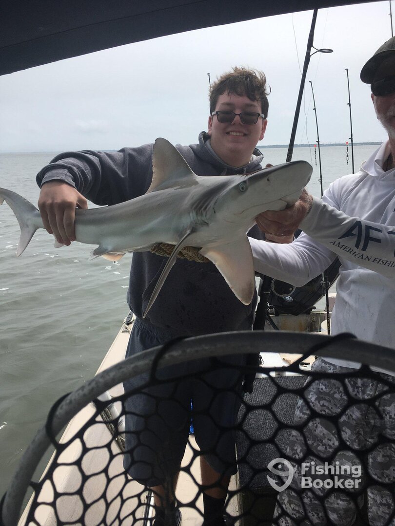Caleb with a great catch and release bull!