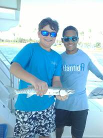 barracuda time at rich and famous boat