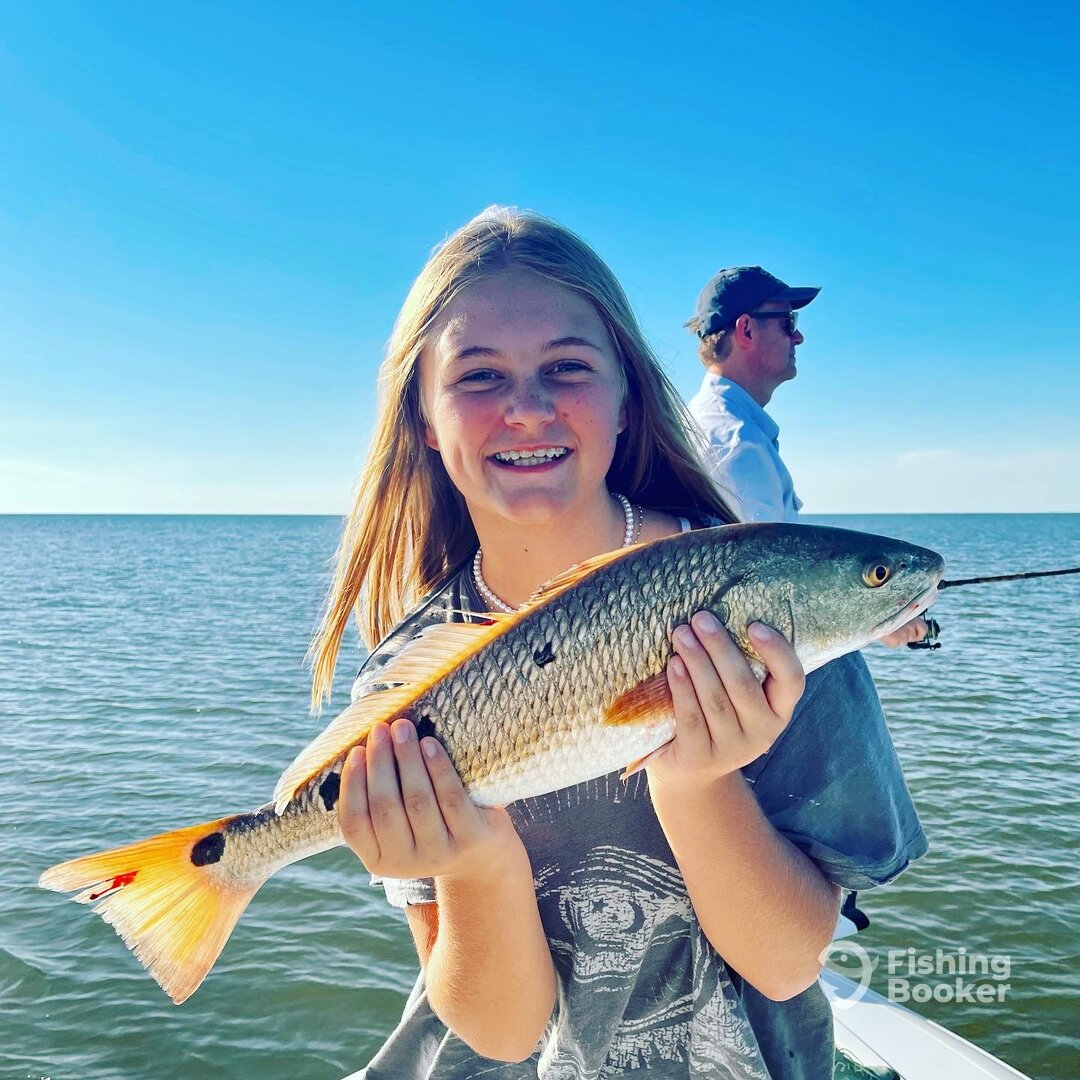Mrs. Olive with her first redfish! 