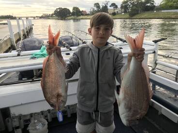 Kids catching big Snapper
