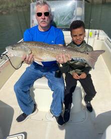 Maddox’s first redfish! 
