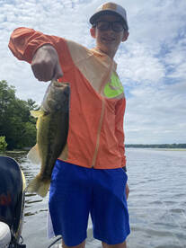 Proud to catch his first bass 