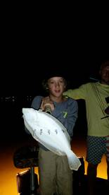 Set the bow down, pick up a titanI'm gog, and poke another good flounder!