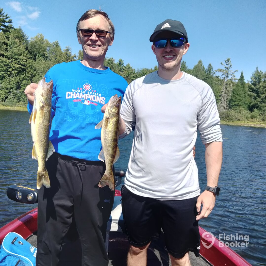 Father and son with a good walleye day