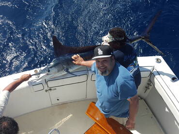 Omar with Striped Marlin!