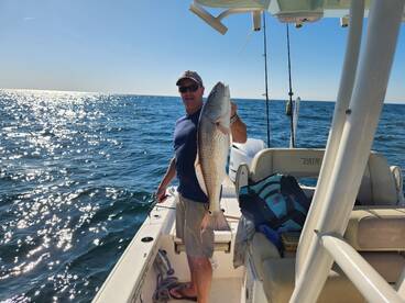Jigging for big Reds nearshore!