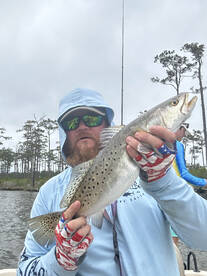 1/2 day on trout and reds