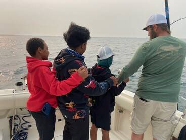 Working hard to out guests on fish!!