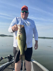 This is the biggest bass of his life 