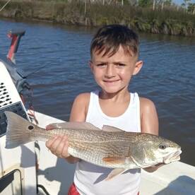 Young angler's first Redfish