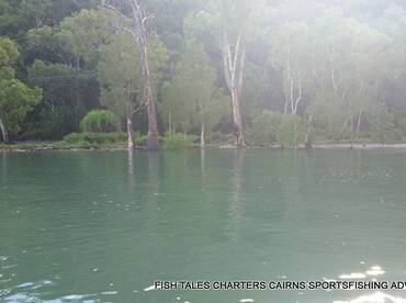 Estuary fishing in the calm waters of Trinity Inlet