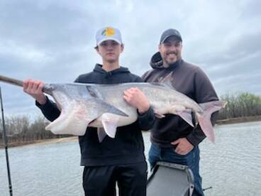 Father and son put it in the Spoonbill