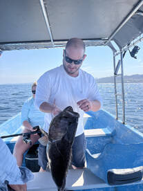 7-kilogram cod in front of Easter beach