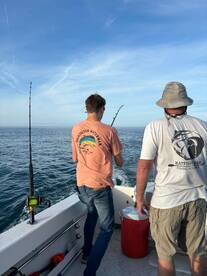 Bringing another Spanish mackerel to the boat.