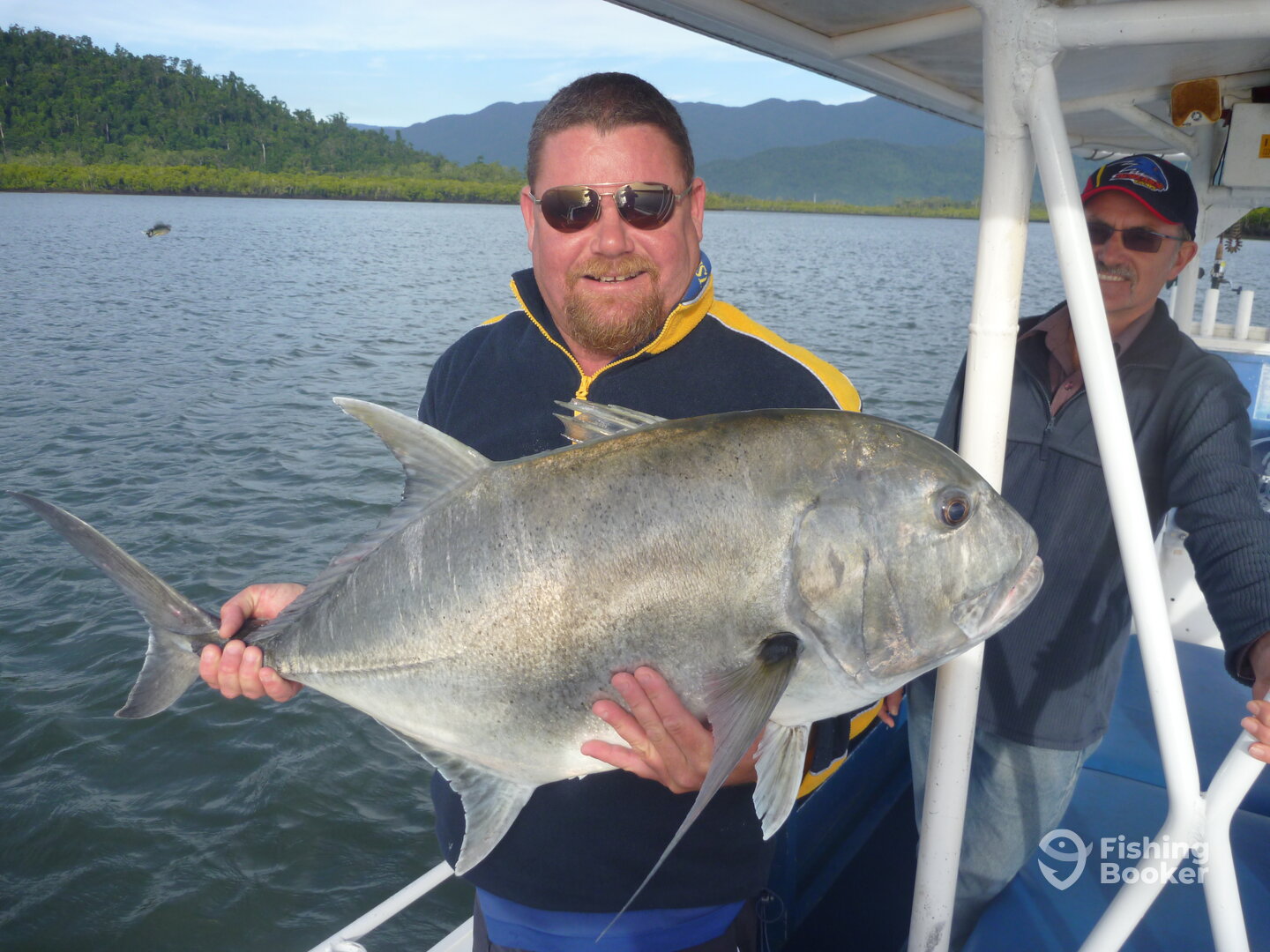 Fishing Guide `Darryl` always on hand to help a Giant Trevally.
