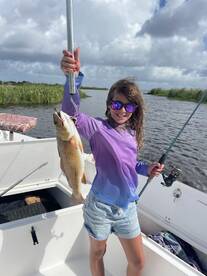 Kids loving the Bayou Life! Hooking REDS