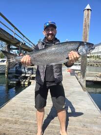 Happy with his biggest fish ever
