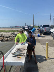 The two boys probably caught 30 trout on