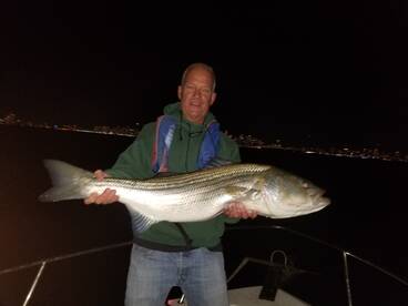 Casting for monster striped bass.  Anyo e can do 