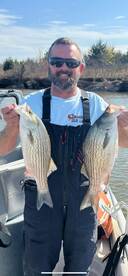 Hybrid Stripers are biting on Sooner!  