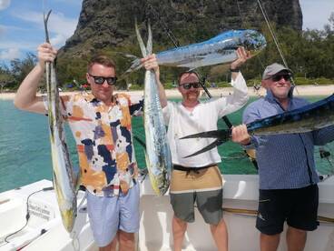 Father and sons spending good time fishi