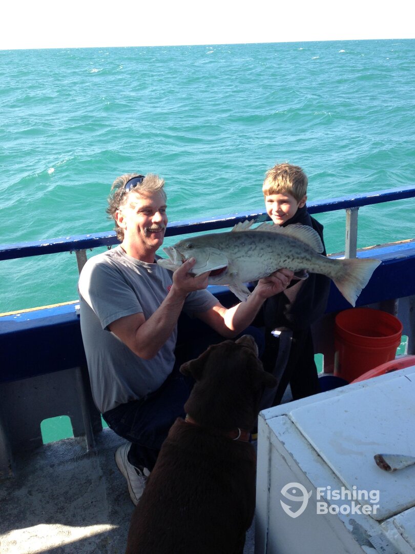 Capt. Joe and Hunter with a gag grouper. This fish was caught in the spring.   