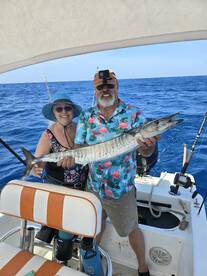 Mr John and Mrs Teresa enjoying the ocea