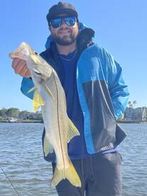 Catching snook even on these windy days!