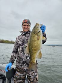Client Evan with a 5+ Presque Isle Bay smallmouth.