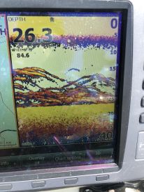 Sonar display showing depth and water temperature, with no visible fish or fishing activity.