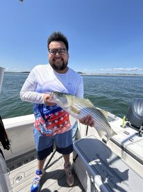 Best Fishing Charter Experience \u2013 Keeper Stripers and Spotless Boat!