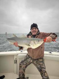 Weather challenged, but Captain Dan got us on some fish
