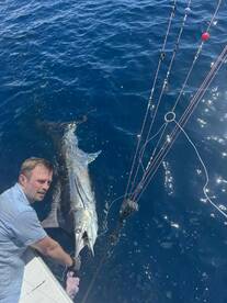Awesame trio with hooked up sportfishing. 